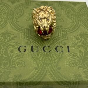 Unisex Gucci, Lionhead motif gold tone with red crystal size 8.5 made in Italy